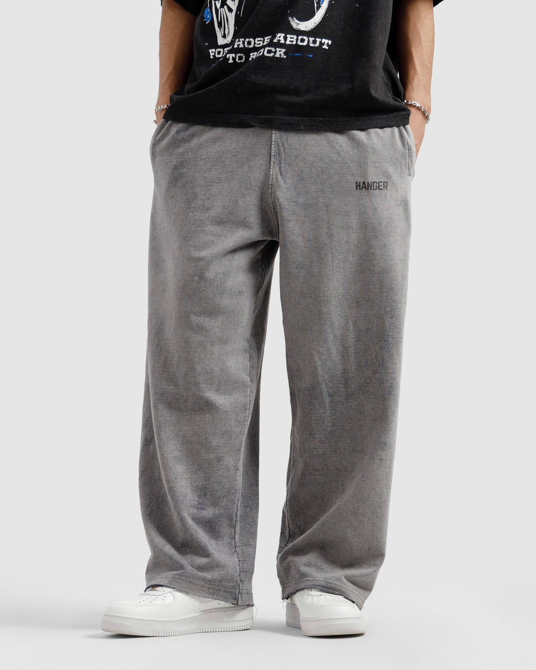 Washed Trousers With Raw Edges